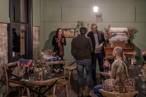 Brian awards Kath the money